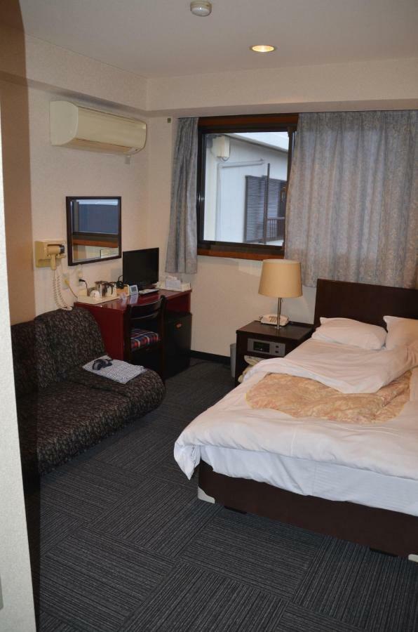 واكايَمَ Business Hotel Top Inn Kagurano المظهر الخارجي الصورة